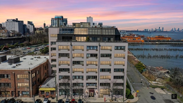 property's view of city featuring a water view