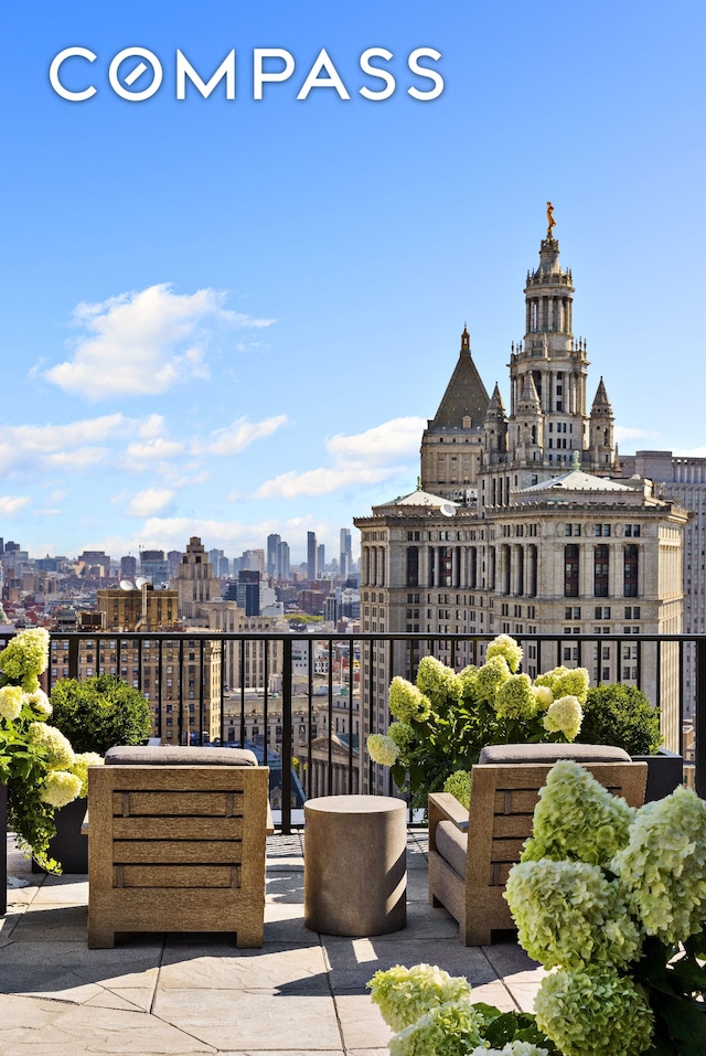 view of patio with a city view