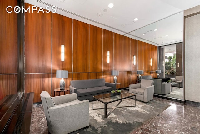 2025 Broadway Unit 29G, New York City, NY 10023 - building lobby with wooden walls and recessed lighting
