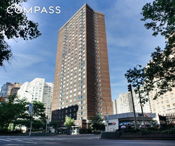 view of building exterior with a city view