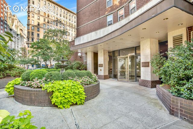 entrance to property with brick siding