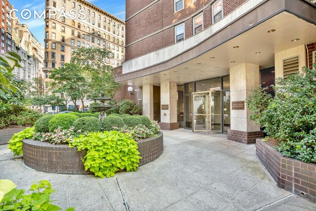 2025 Broadway Unit 29G, New York City, NY 10023 - doorway to property featuring brick siding