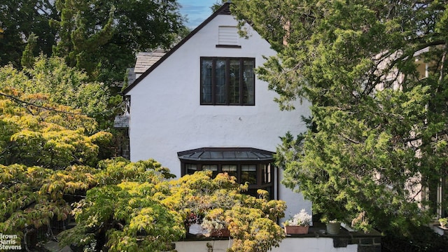 exterior space featuring stucco siding