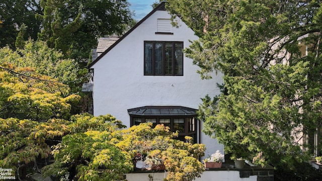 exterior space with stucco siding