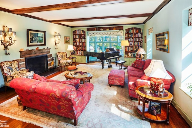 living room featuring crown molding and beam ceiling