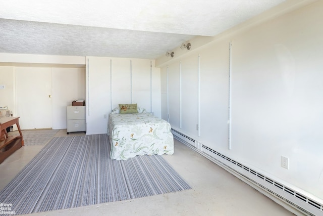 bedroom featuring a baseboard radiator