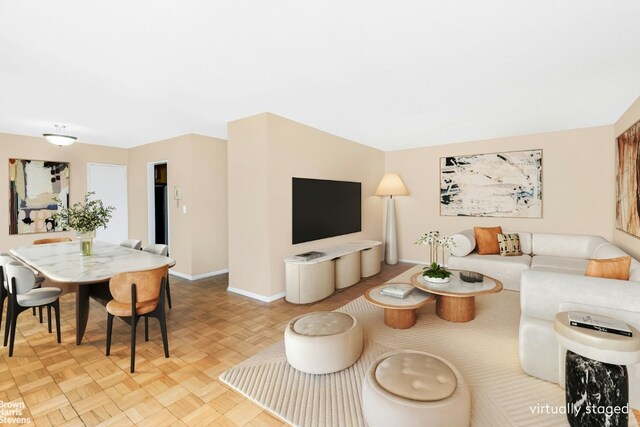 living room featuring light parquet floors