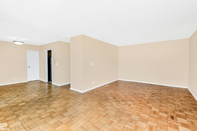 empty room featuring light parquet flooring