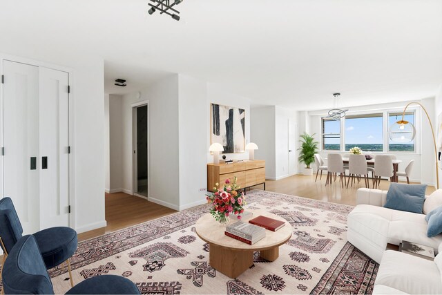 1655 Flatbush Ave Unit B1806, New York City, NY 11210 - living area featuring wood finished floors and baseboards