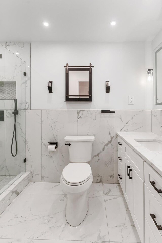 1655 Flatbush Ave Unit B1806, New York City, NY 11210 - full bath with vanity, a marble finish shower, tile walls, marble finish flooring, and recessed lighting