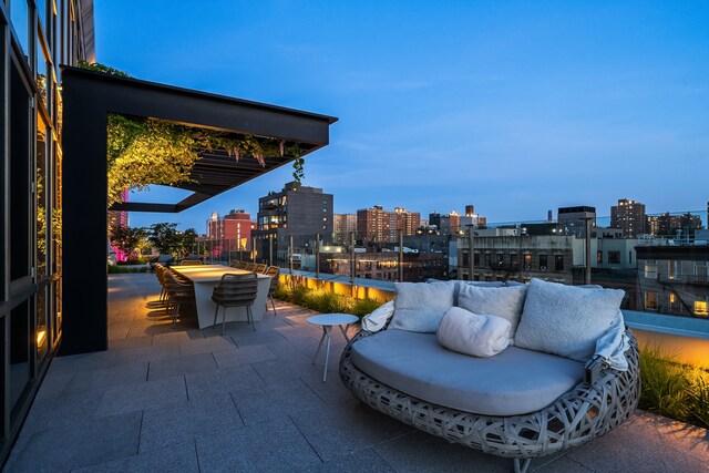 view of patio / terrace with an outdoor fire pit