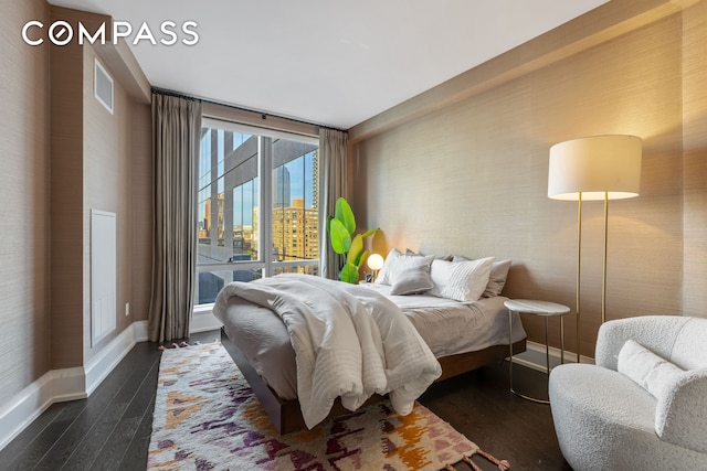 50 Riverside Blvd Unit 19F, New York City, NY 10069 - bedroom with baseboards and dark wood finished floors