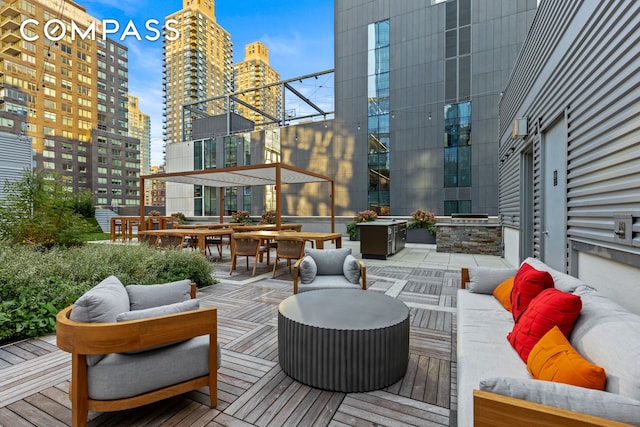 50 Riverside Blvd Unit 19F, New York City, NY 10069 - wooden deck with outdoor lounge area, a view of city, and outdoor dining area
