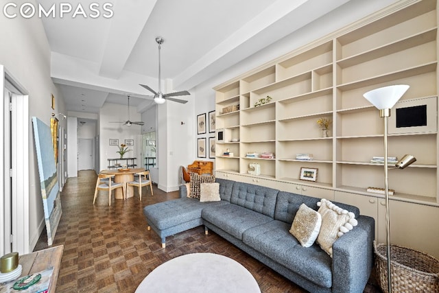 living room featuring ceiling fan