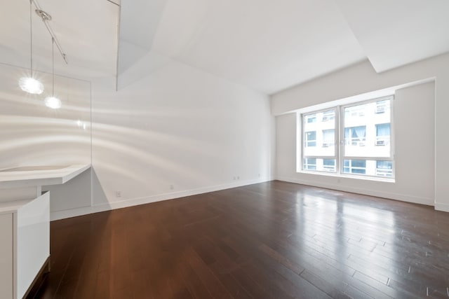 interior space with dark hardwood / wood-style flooring