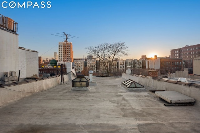 view of patio terrace at dusk