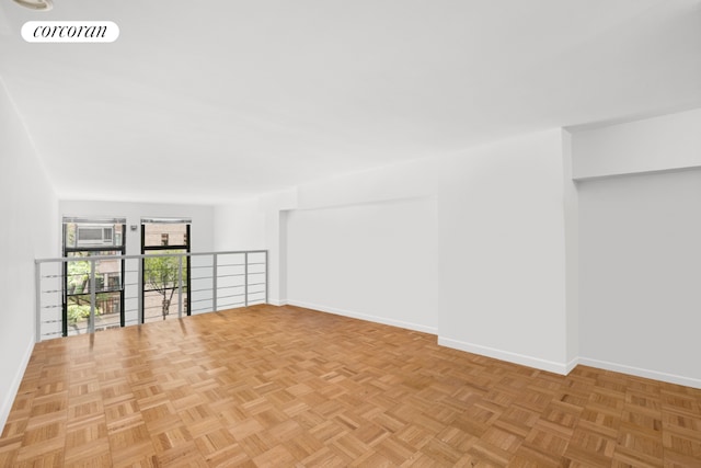 spare room with light parquet flooring