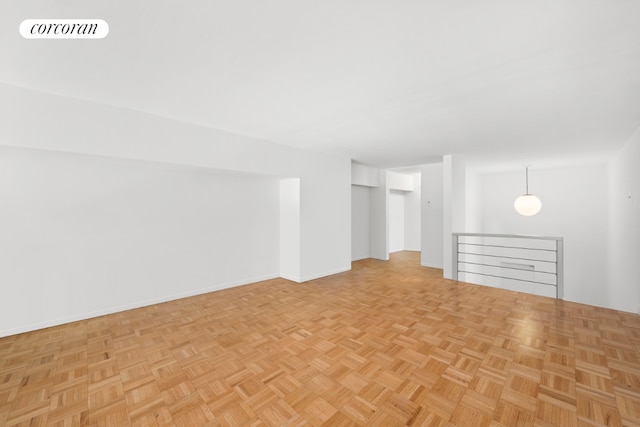 spare room with light parquet flooring