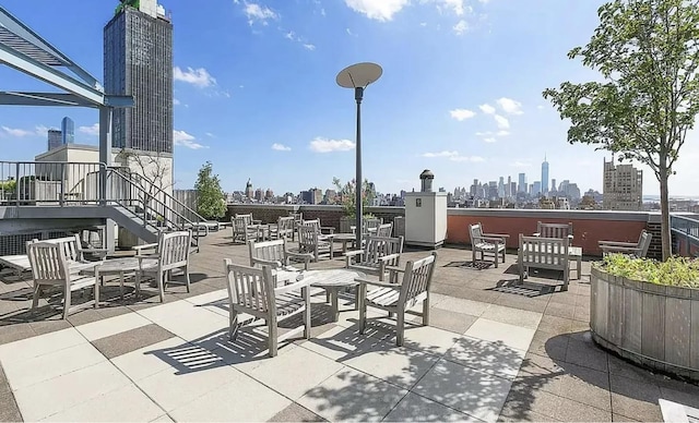 view of patio / terrace with a skyline view and stairs