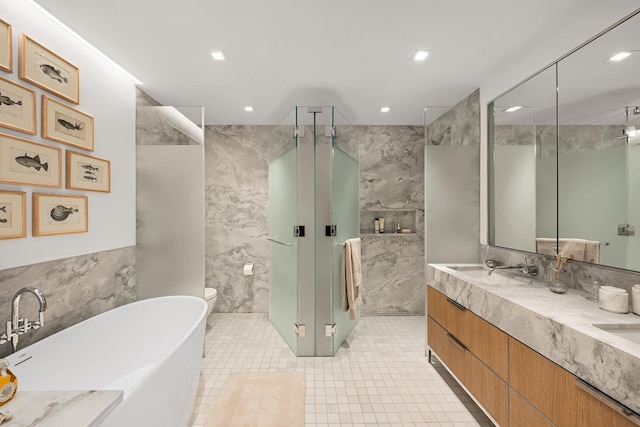 full bathroom featuring tile walls, a soaking tub, and a stall shower