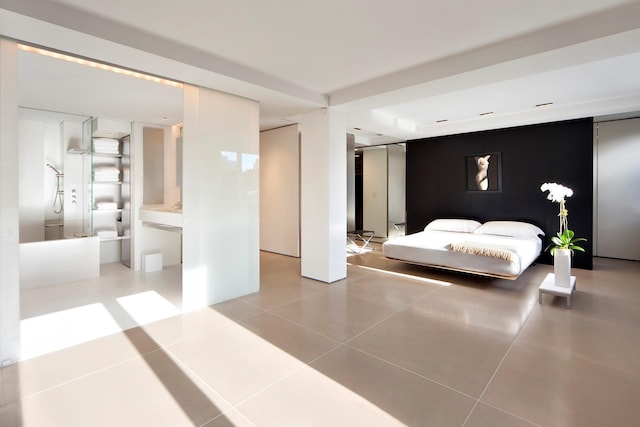 bedroom featuring tile patterned floors