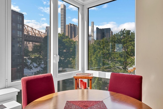 sunroom / solarium with a city view