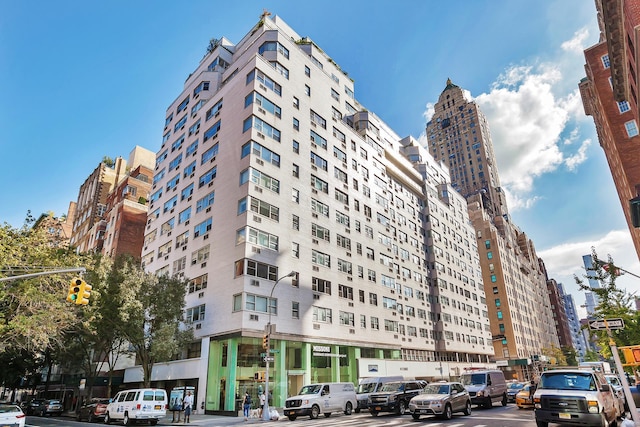 view of building exterior featuring a city view