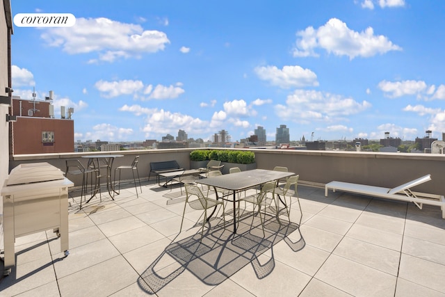 view of patio with a city view