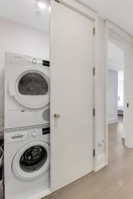 bedroom featuring light hardwood / wood-style floors and a closet