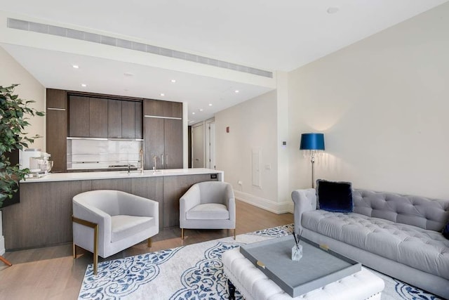 living room with hardwood / wood-style flooring