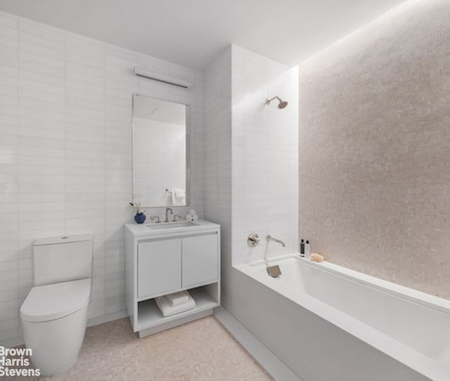 full bathroom with vanity, toilet, independent shower and bath, and tile walls