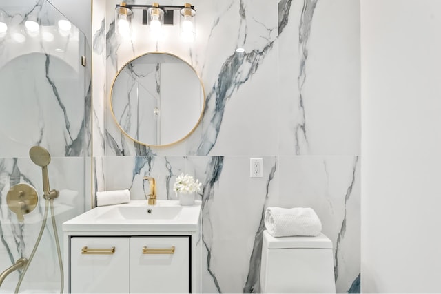 full bath with tile walls, toilet, vanity, and a shower
