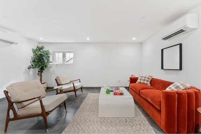 living area featuring a wall mounted AC, recessed lighting, and finished concrete flooring