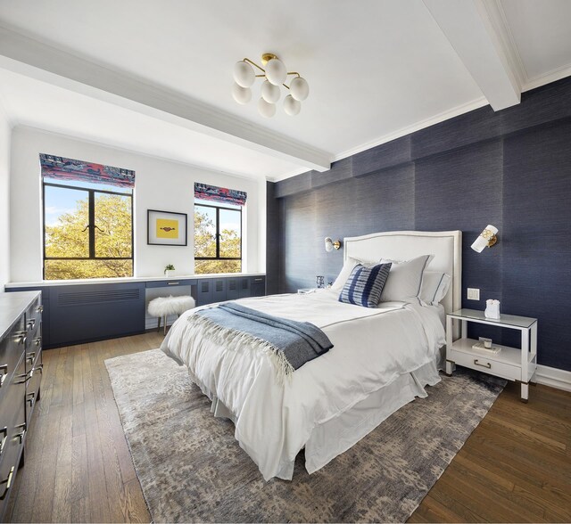 bedroom featuring ornamental molding, beam ceiling, and dark hardwood / wood-style flooring