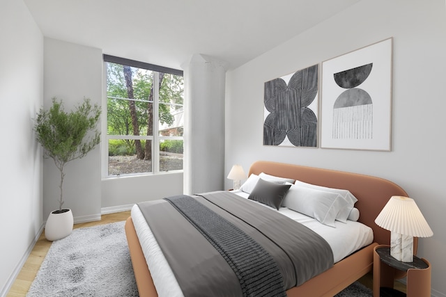 bedroom featuring light wood-type flooring