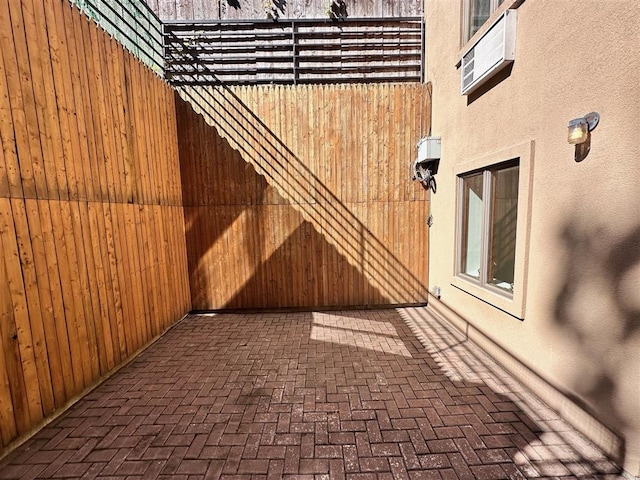 view of patio / terrace featuring fence