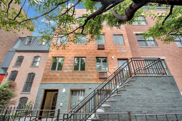 view of building exterior featuring stairs