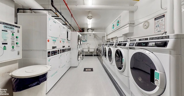 laundry area featuring stacked washer and clothes dryer and washer and clothes dryer