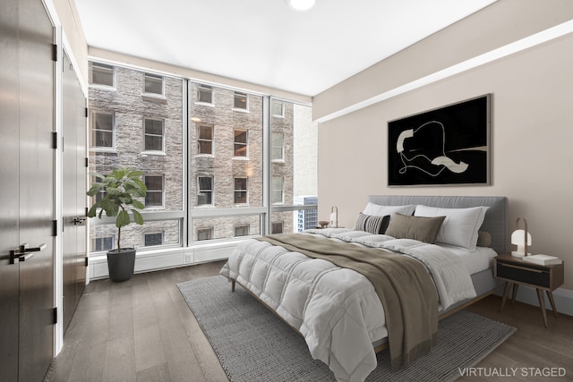 bedroom featuring wood finished floors