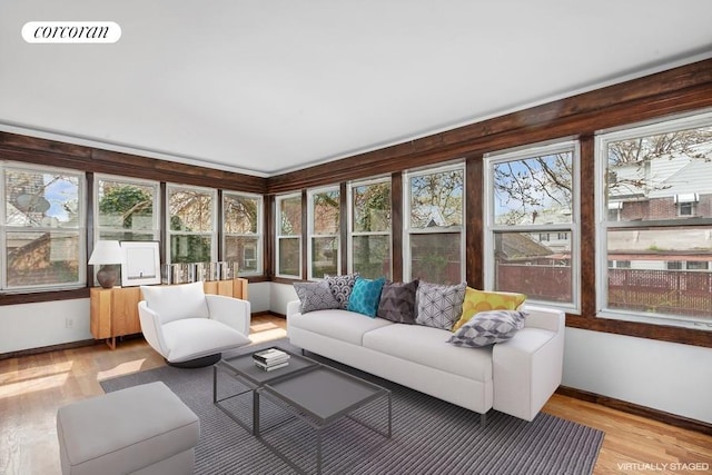 sunroom / solarium featuring plenty of natural light