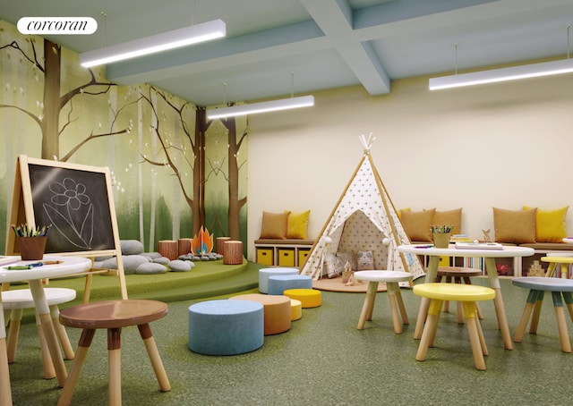 recreation room with beam ceiling