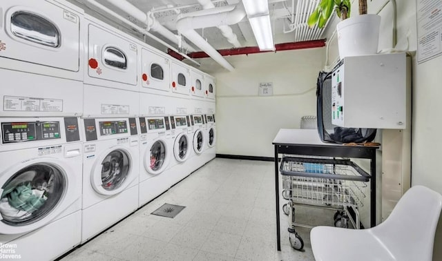 laundry room with washer and clothes dryer and stacked washer and dryer