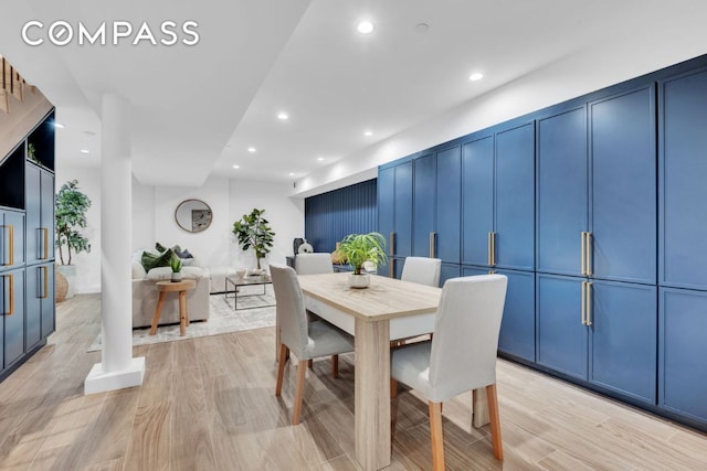 dining space featuring light hardwood / wood-style floors