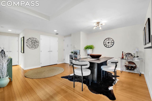 dining space featuring hardwood / wood-style floors