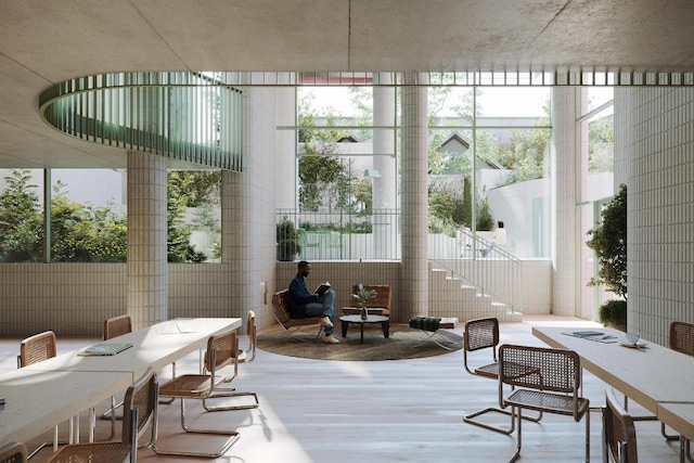 sunroom / solarium with a wealth of natural light