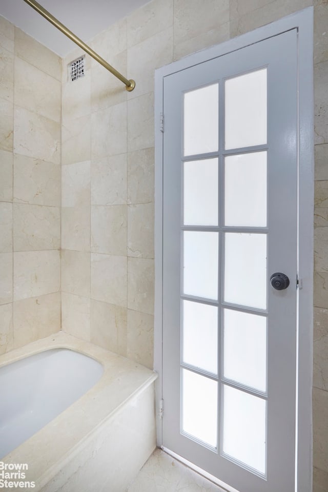 full bath featuring a bathtub and walk in shower