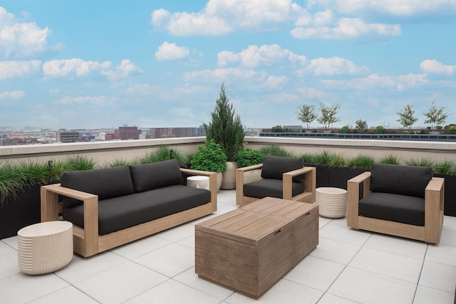 view of patio / terrace with a view of city and outdoor lounge area