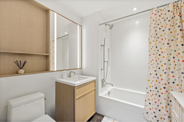 full bathroom featuring vanity, shower / tub combo, and toilet