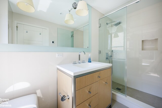 bedroom featuring beamed ceiling and hardwood / wood-style floors