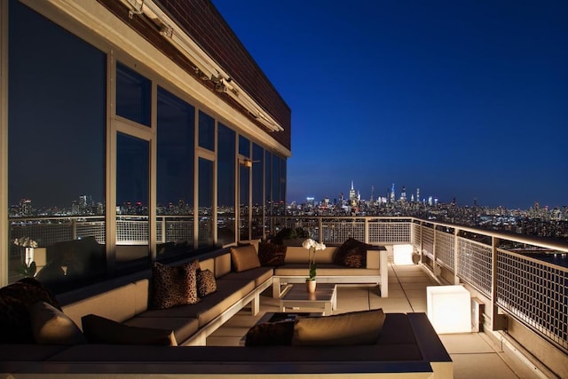 balcony at night with an outdoor living space